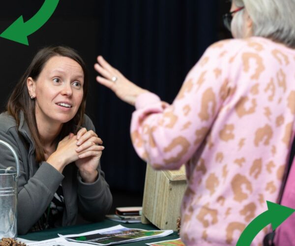 Two people chatting about Carbon Charter